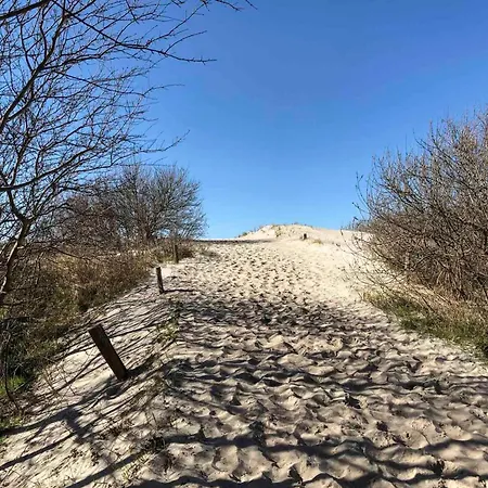 Semesterbostad Strandhaus Duenenwind *